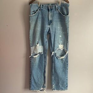 Patchwork Naturally distressed bootcut  jeans